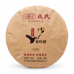 Чай Шу Пуэр Mengku Rongshi Mu Ye Chun 3-летний 2014 года 400 г